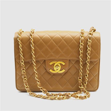 chanel vintage bag fabric with coco silouette|luxury Chanel bag.